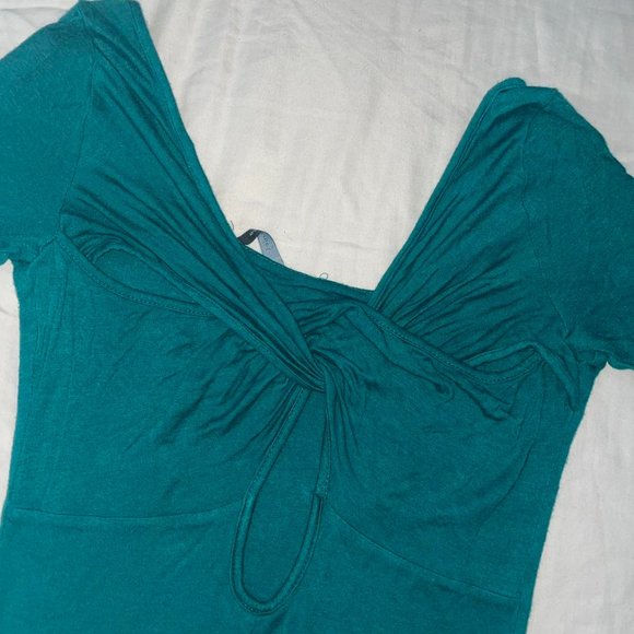 Turquoise body con dress with cross back in design size small - Picture 3 of 3